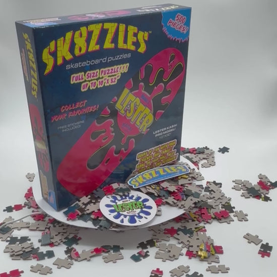 A 360 degree video of The Lester Pink Sk8zzle Skateboard puzzle is a 12"x34" full-sized puzzle of the legendary Lester Splat Graphic.