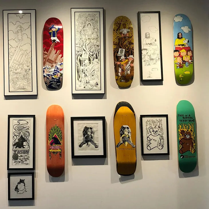 picture of the wall of a skateboard collector.